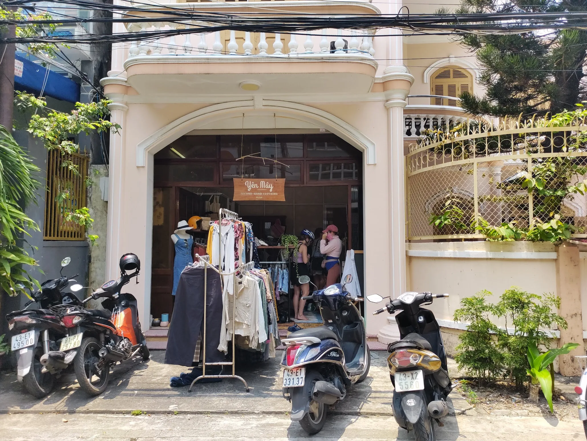 Customers browsing the original Yen May shop