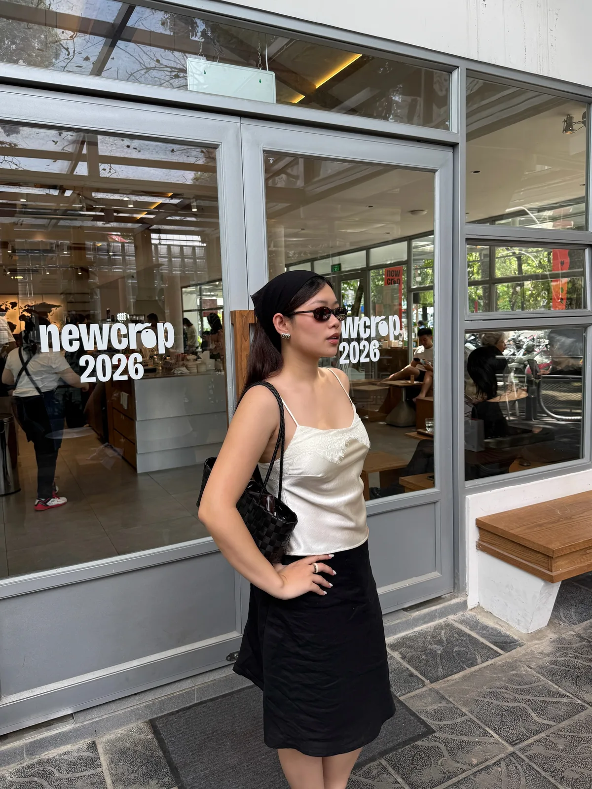 Customer wearing a tailored black vintage outfit